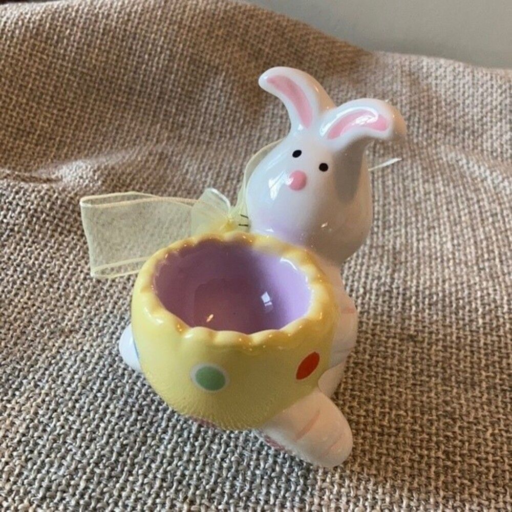Ceramic rabbit egg holder.